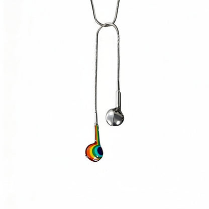 Necklace with a colorful pendant on a white background